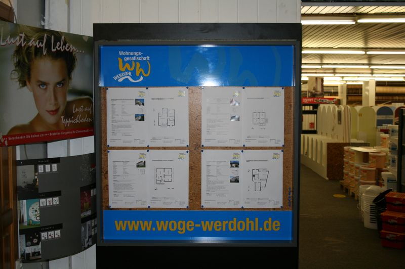 Werbetafel der WOGE-Werdohl im TT-Markt
